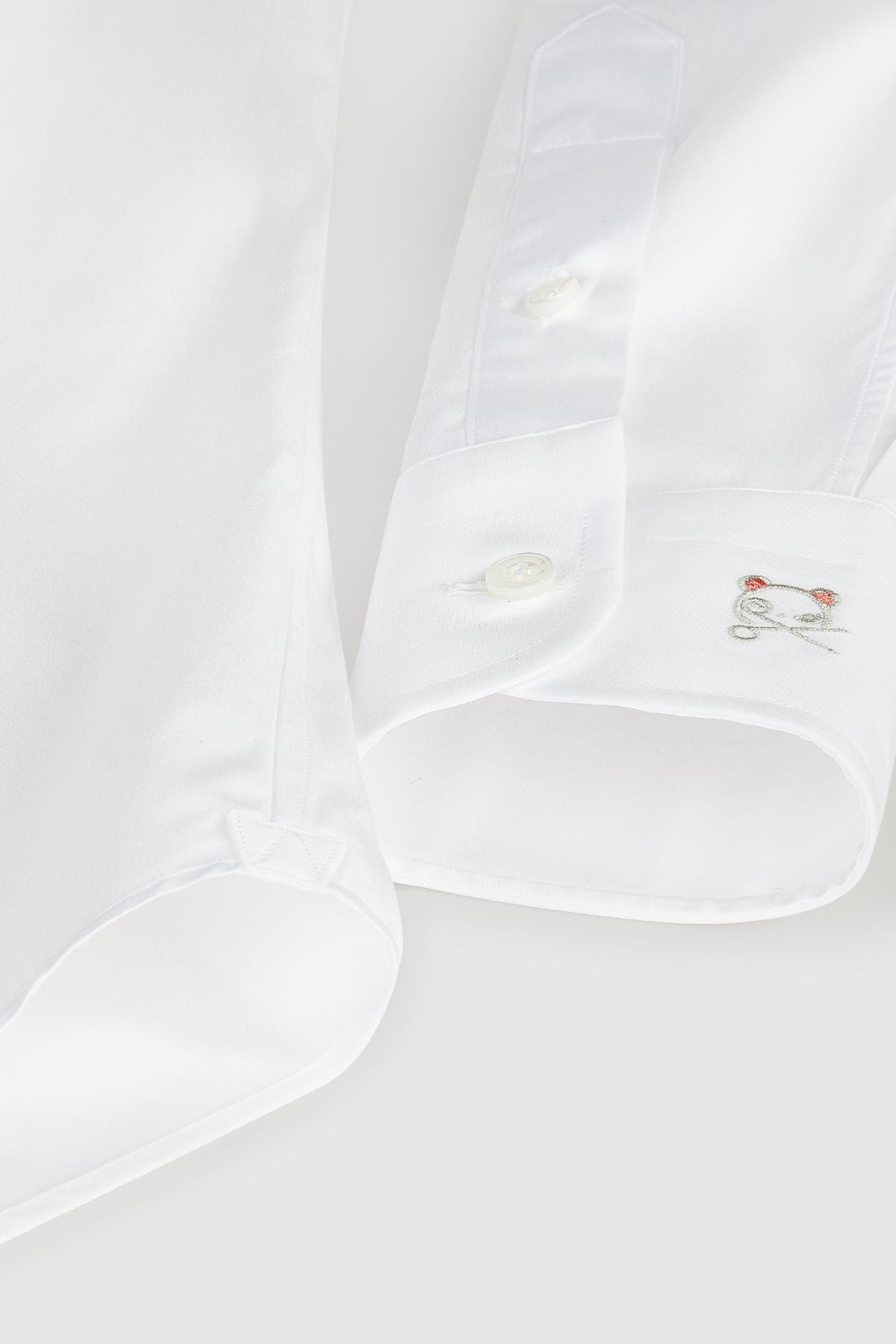 POPELINE ELEGANTE ricamo logo sul polso sinistro